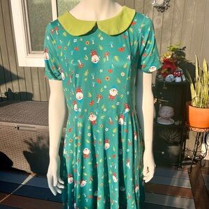 Unique Vintage Green Dress with Whimsical Print